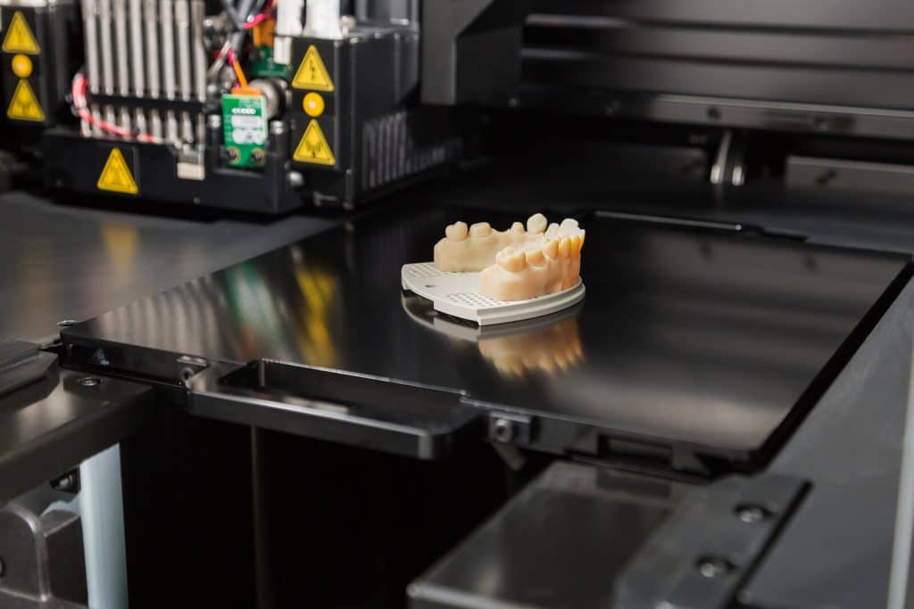 3D Printer With Finished 3D Printed Dental Implant Bridge|3D Printer With Finished 3D Printed Dental Implant Bridge