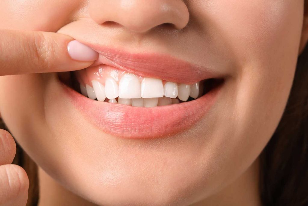 Young woman with healthy gums